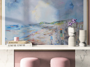 Sidmouth Bay Coastal Painting displayed above a modern pink and white decor, capturing coastal serenity.