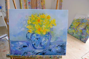 Daffodils in Blue Jug Floral Still Life – Impressionistic Oil Painting with vibrant yellow flowers in a blue jug.