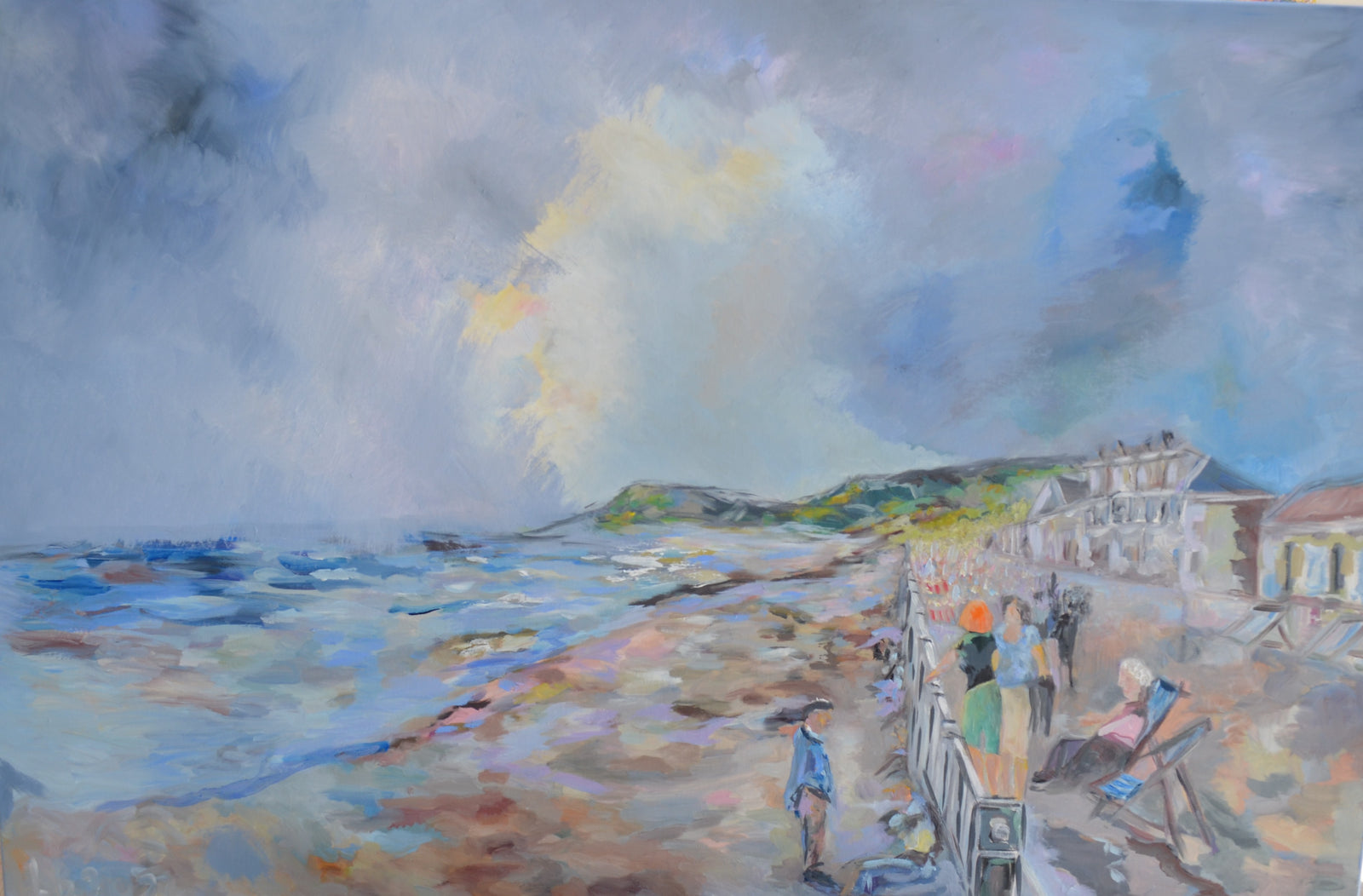 Sidmouth Bay Coastal Painting displayed in a modern interior, showcasing the impressionistic beach scene and vibrant colors.