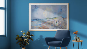 Sidmouth Bay Coastal Painting displayed in a modern living room with blue walls and stylish furniture.